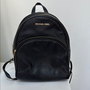 Michael Kors black pebble leather Abbey backpack, excellent condition.